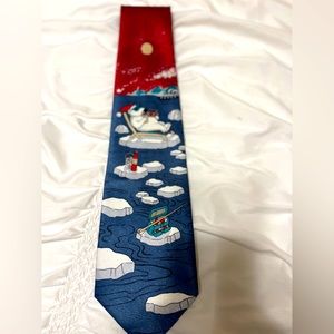 The Christmas Collection man’s blues/reds 100% polyester Santa tie